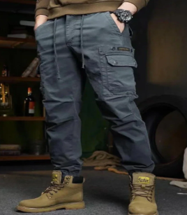 Men wearing Urban Explorer Cargo Pants in beige and black with multiple cargo pockets outdoors